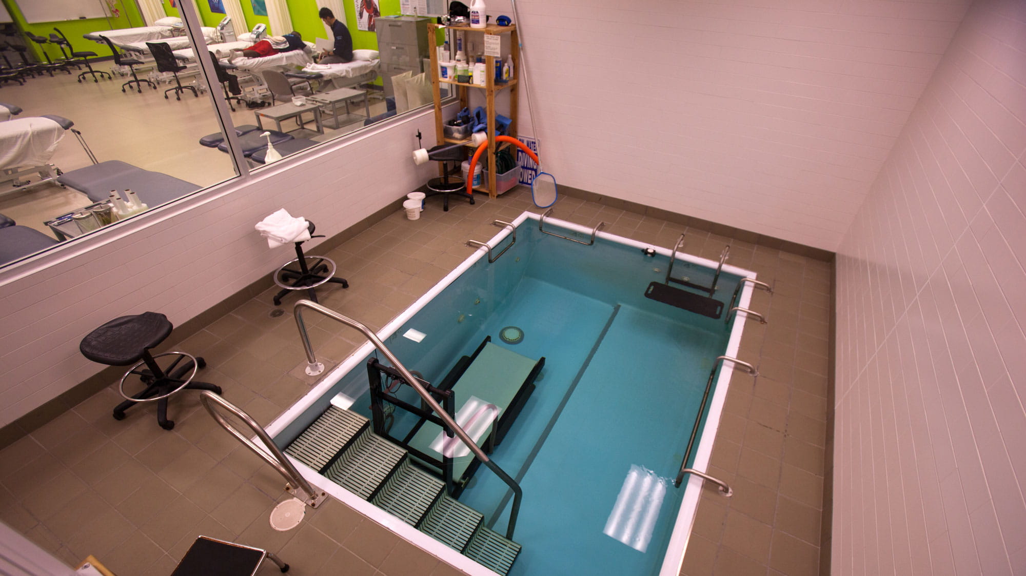 A small pool with an underwater treadmill in Sheridan's Athletic Therapy Clinic