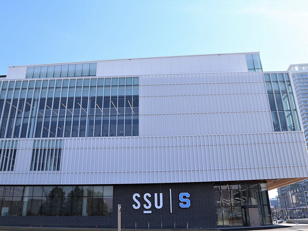 An exterior shot of the Student Centre at Hazel McCallion Campus, looking at the front of the building.