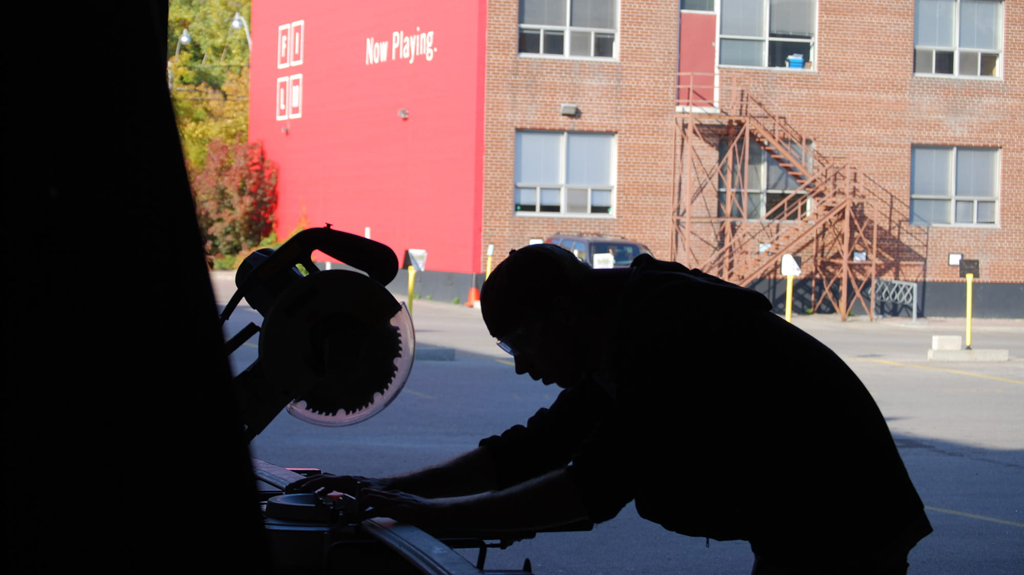A student unpacking equipement outside SIRT