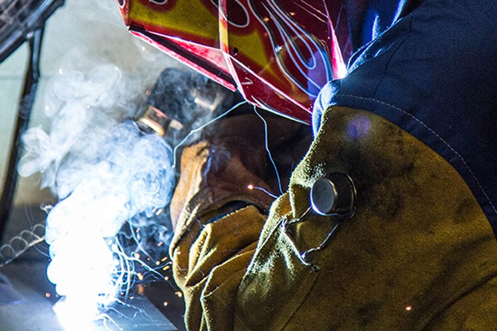 Sheridan College student welding