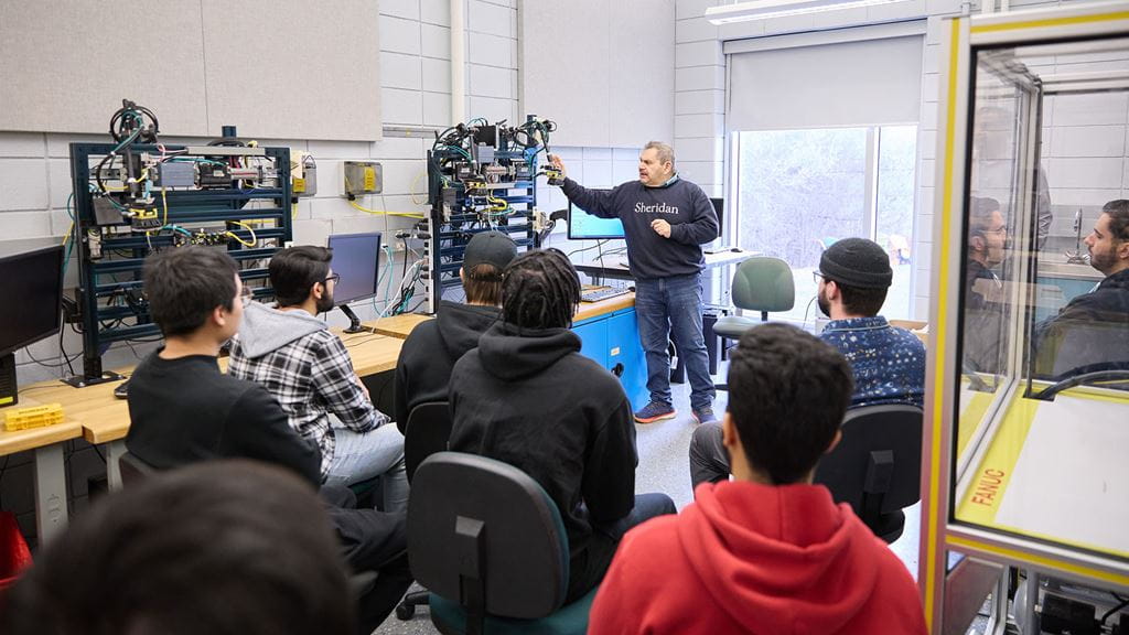 A professor teaching a group of students