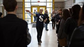 A Sheridan representative conducting a tour