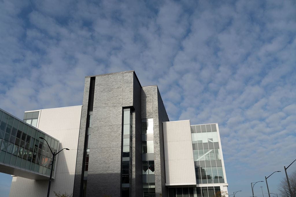 A building at Sheridan's Hazel McCallion Campus set against a blue sky