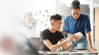 Students exploring google home device