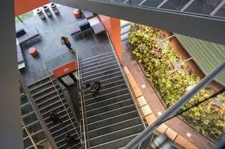 Staircase looking down at ascending students
