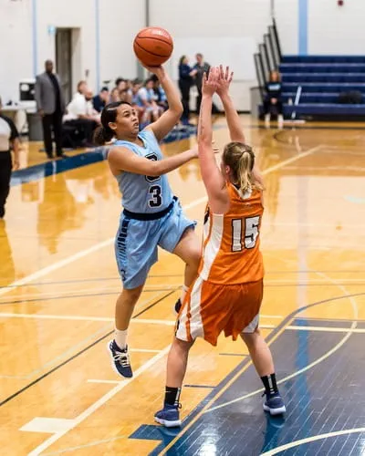 Women's basketball players on the court