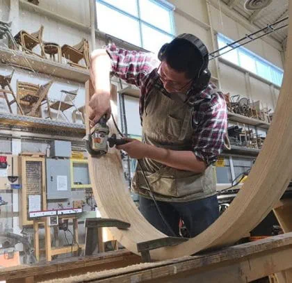 Samson working on the headrest for the chair