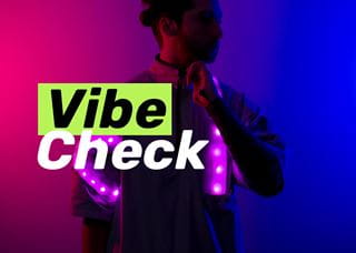 Gianfranco Macagnan in the background wearing his wearable device with Vibe Check words in the foreground