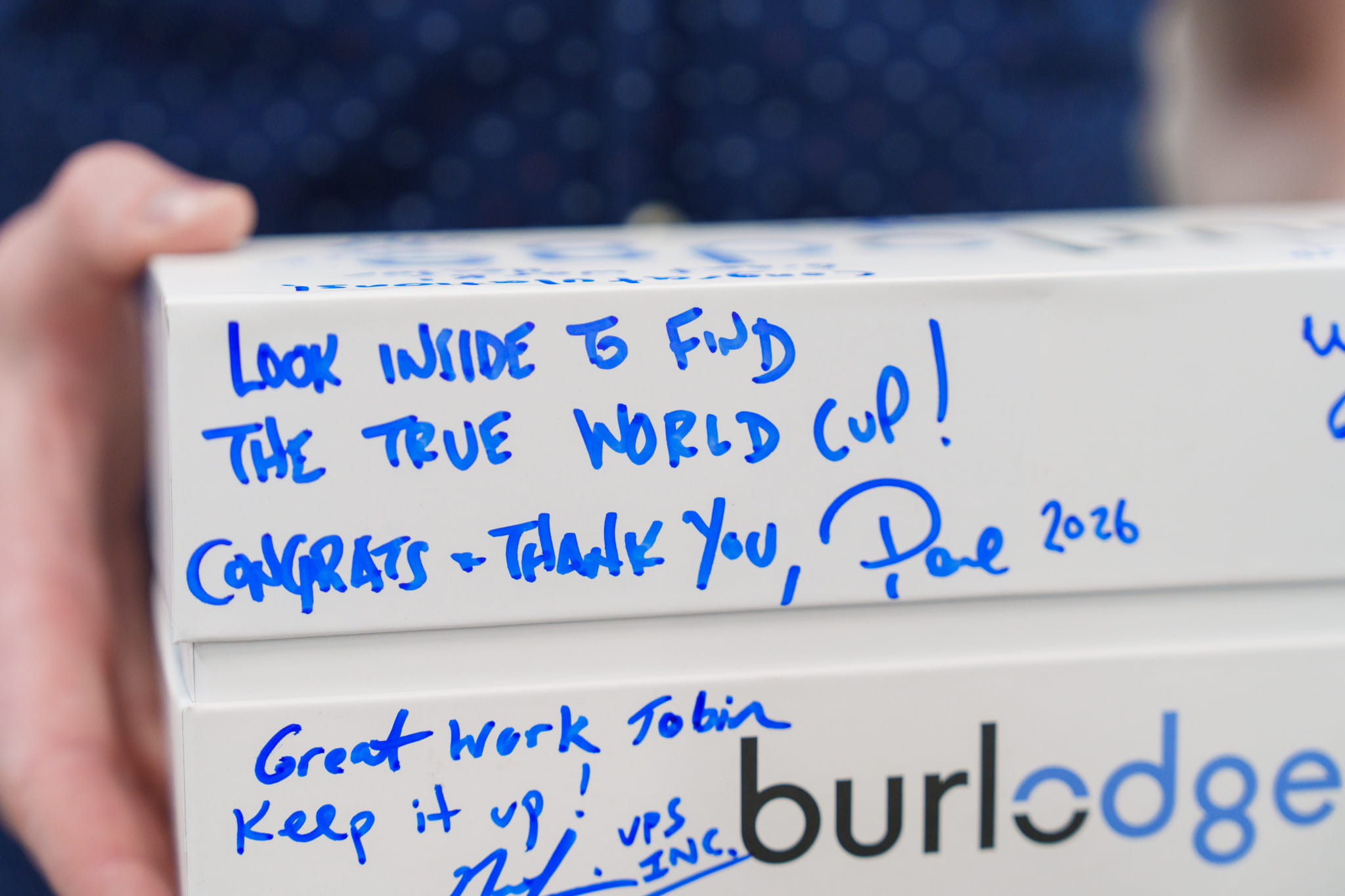 A signed box containing the cup and bowl product samples, with the inscription of 'Look inside to find the true World Cup!'
