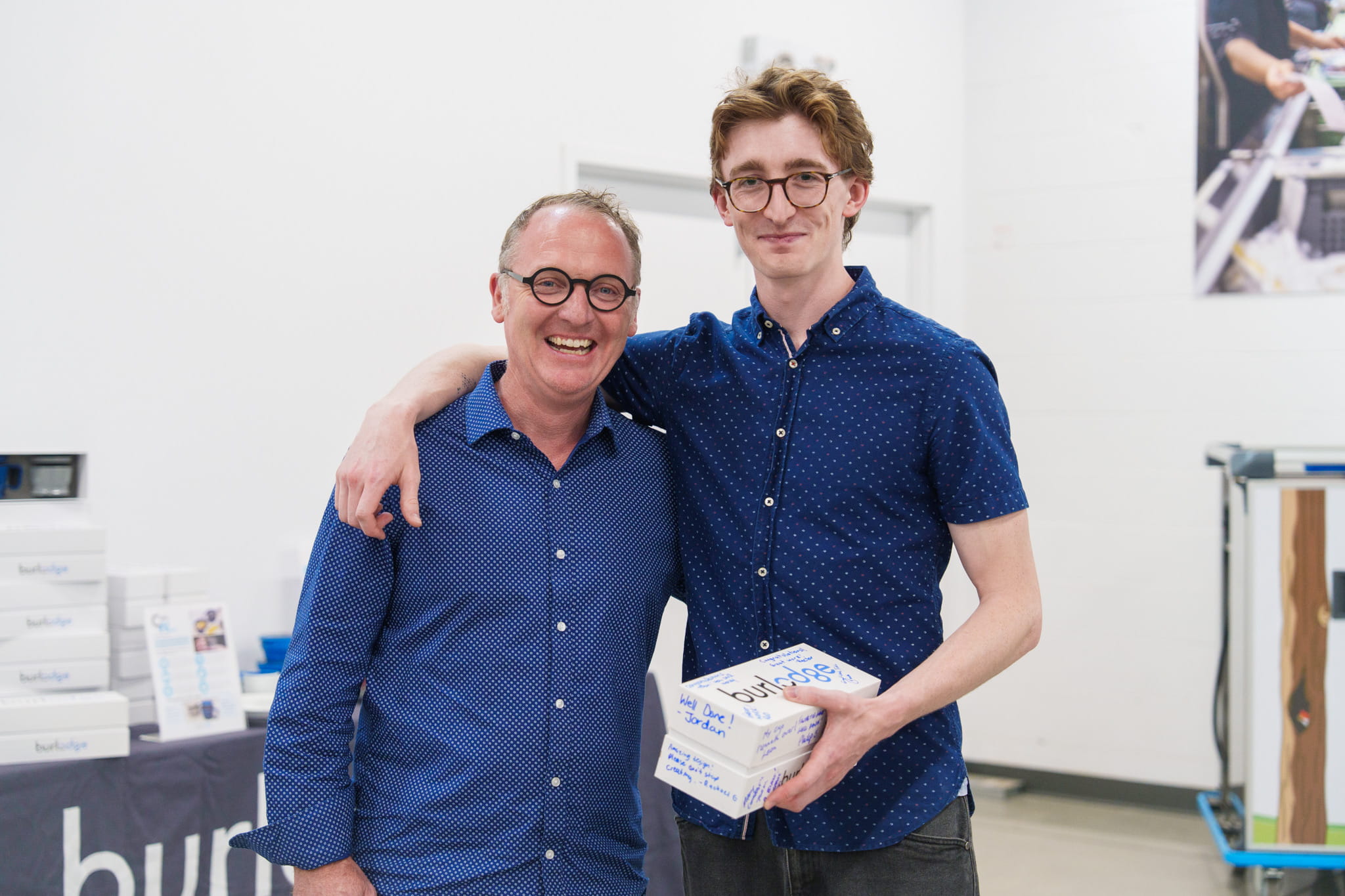 Industrial Design professor Scott Currie is pictured with former student Tobin Nickle-Lott