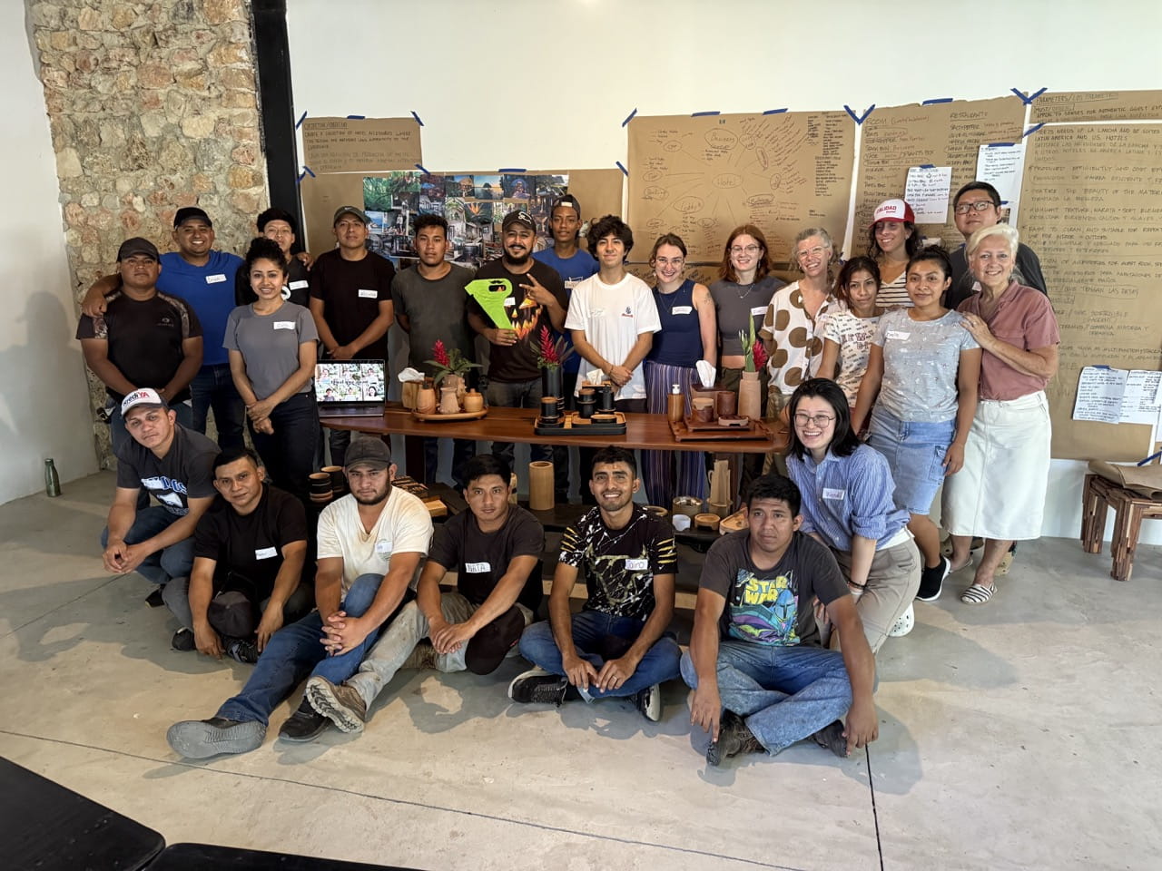 Craft and Design students and staff gather with members of the Itza Wood team for a group photo to celebrate their successful collaboration.