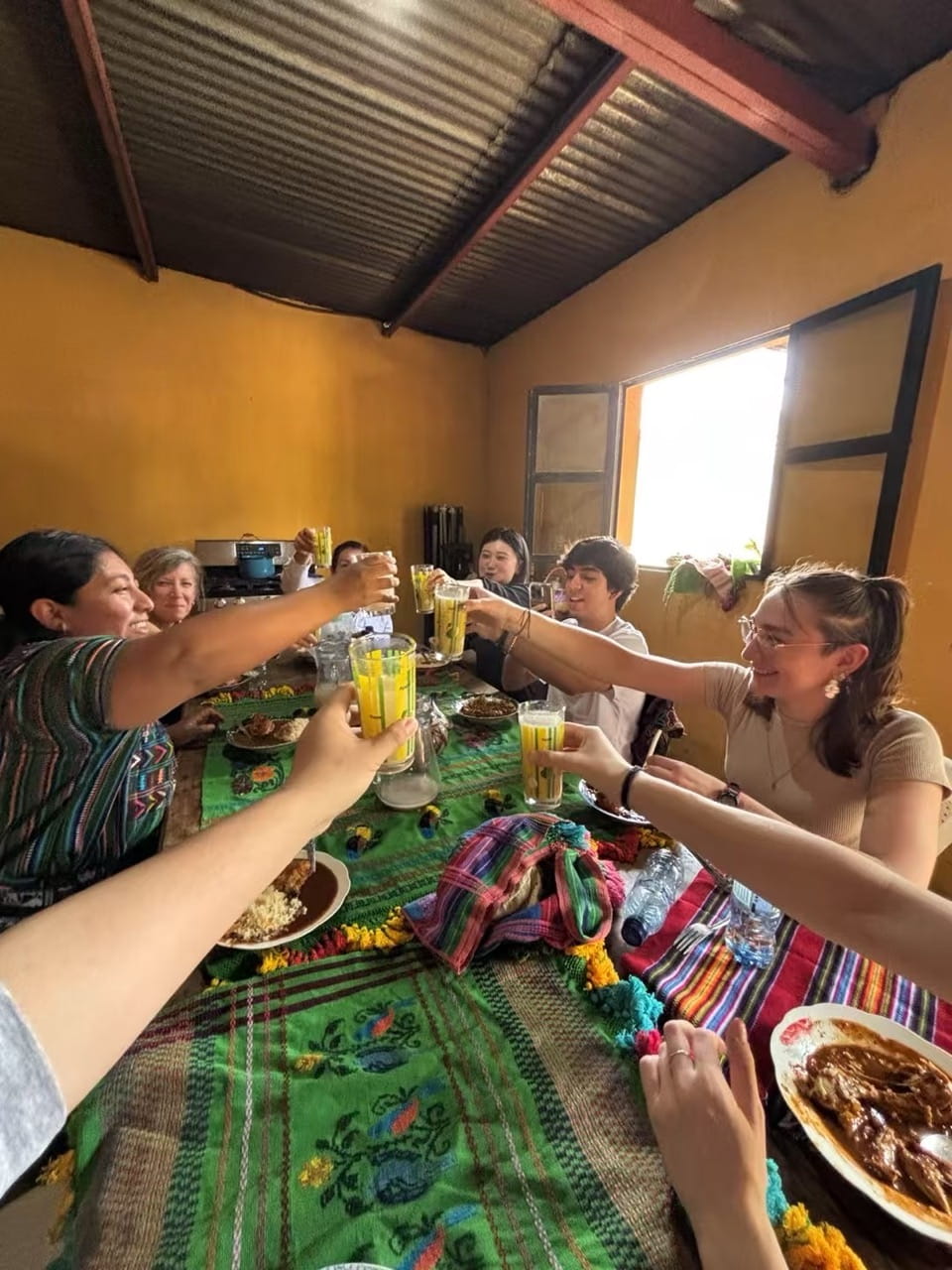 After learning traditional Mayan weaving techniques, Sheridan students and staff joined local residents for a shared lunch of traditional Pepían — a hearty stew featuring chicken and vegetables in a rich, savoury sauce made with roasted spices, tomatoes and aromatic ingredients.