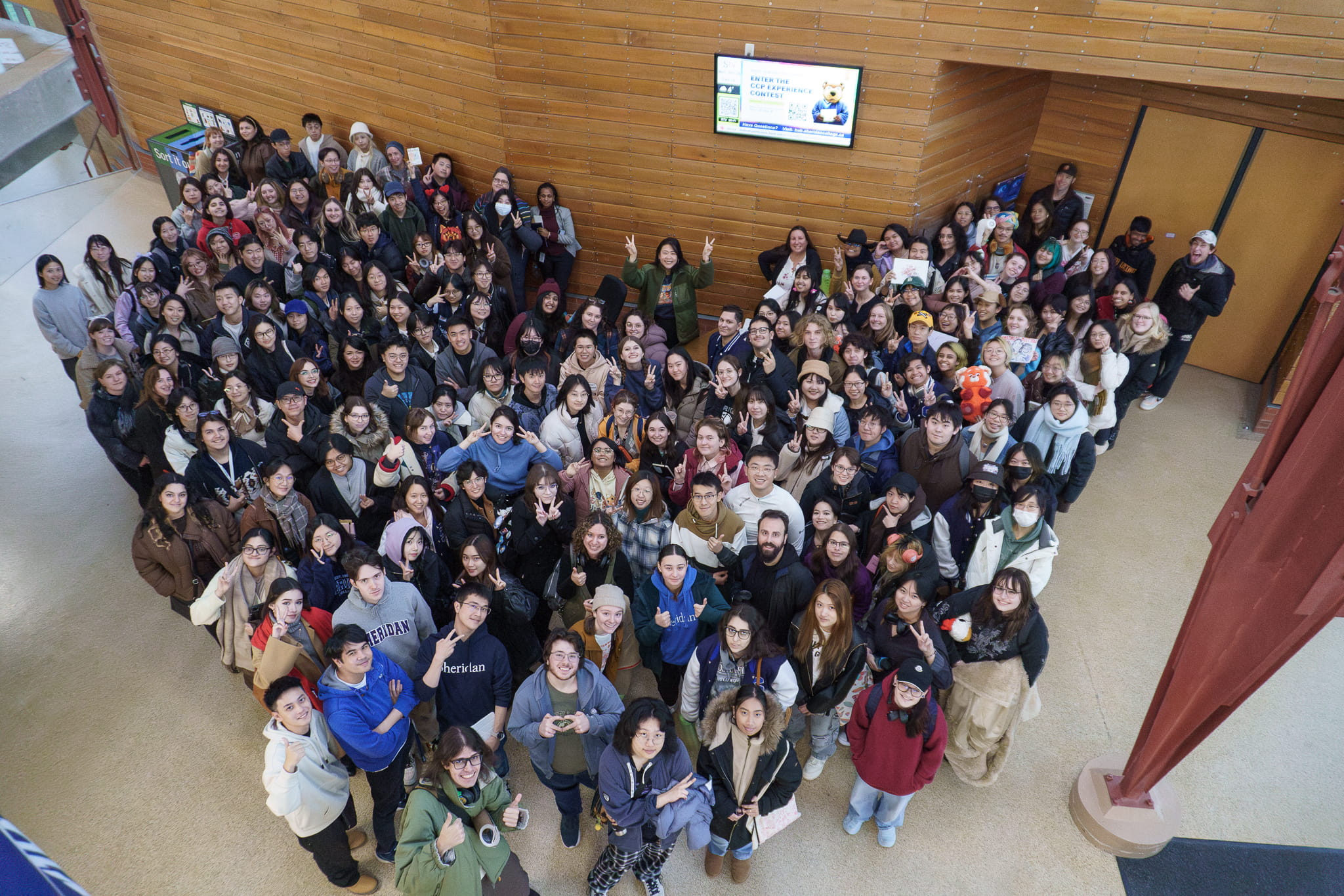 Third and fourth-year animation students gather for a group photo with Academy Award-Winning director and Sheridan alumna Domee Shi (Bachelor of Animation '11)