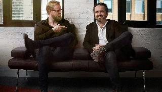 Guru 2 guys on couch