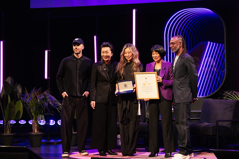 Maggie Kang receives the Key to the City from Mayor Olivia Chow alongside Sheridan President, Dr. Cindy Gouveia and Kevin Barton and Pat Murphy from Depature Festival.