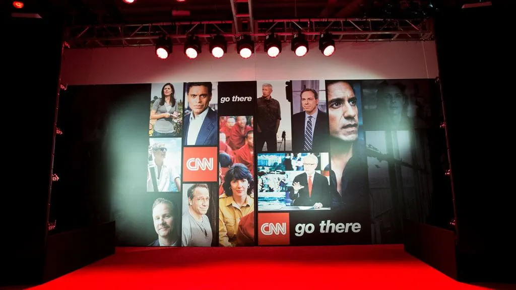 A CNN graphic promoting many of the station's on-air personalities