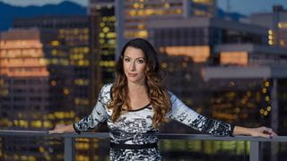 Kim Pickett on balcony