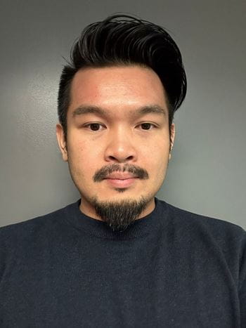 A head and shoulders portrait of Daniel Ta