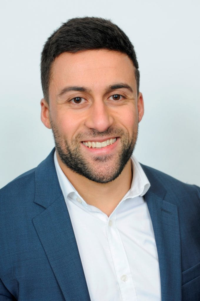 Aaron Pacherco smiling