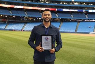 Student receiving Omer Blue Jays Scholarship
