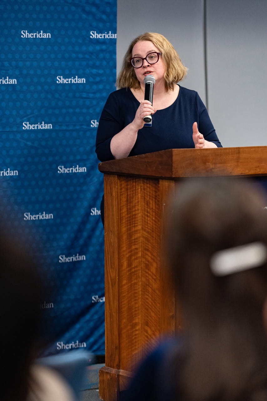 Faculty of Applied Science and Technology Dean Dr. Elizabeth Fabbroni speaks at the podium
