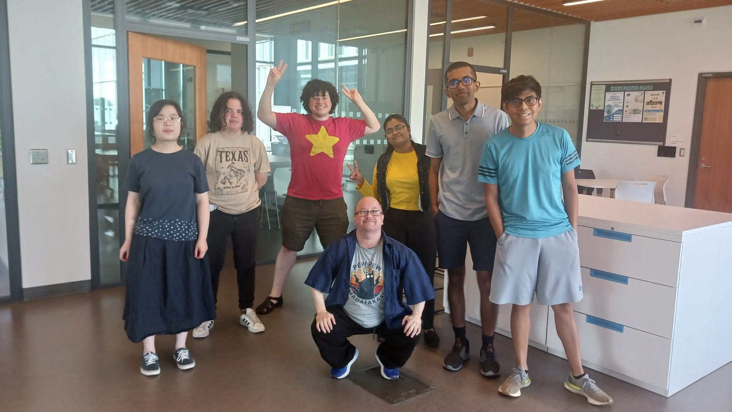 A group of FACE IT club members posing for a picture.