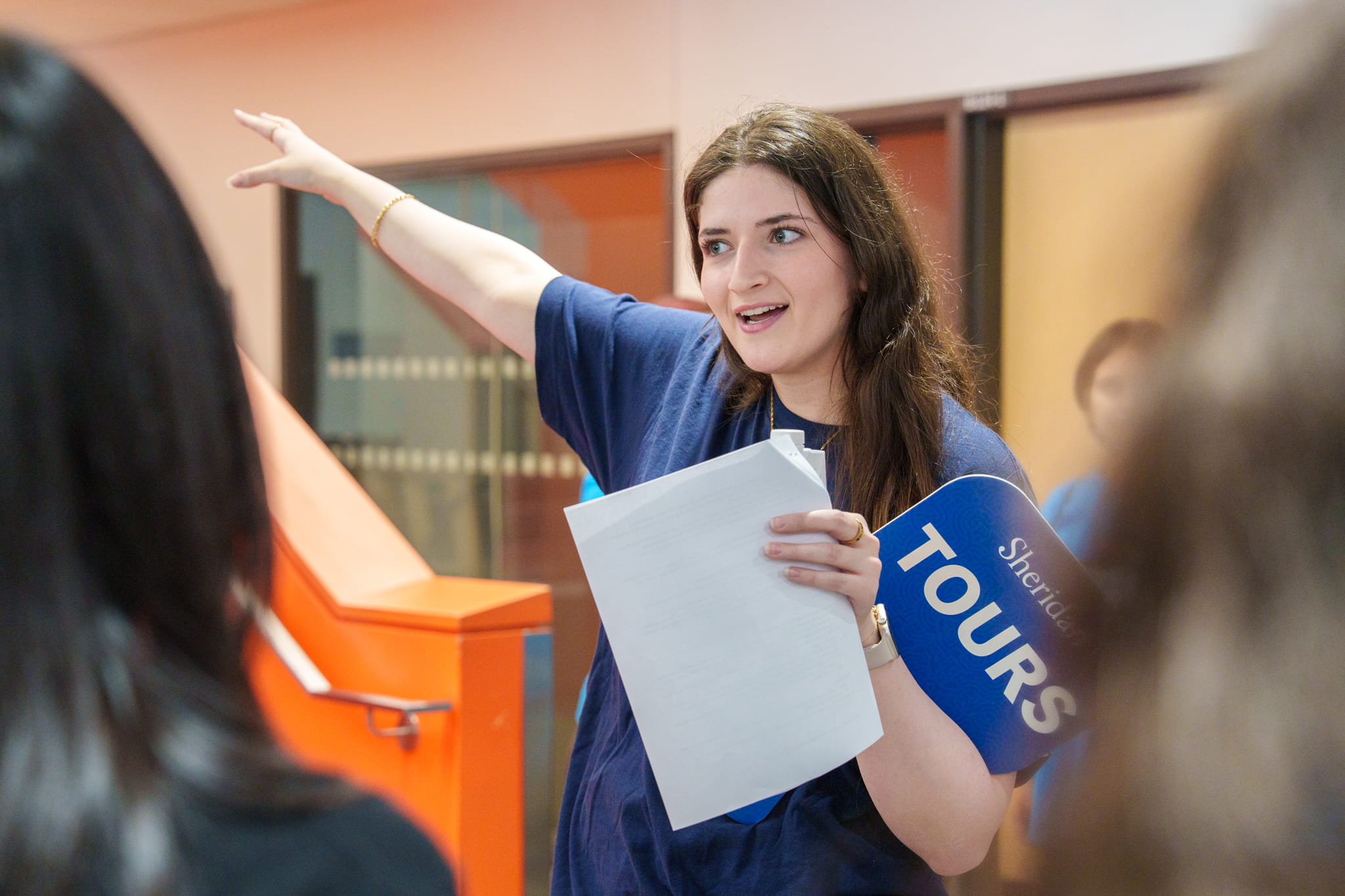 A Sheridan Student Ambassador leads a campus tour at the Hazel McCallion Campus in Mississauga