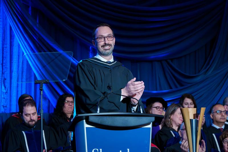 Honourable Nolan Quinn delivers his remarks at the podium.