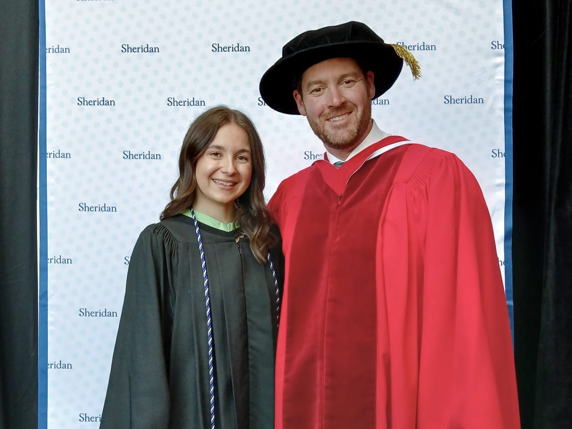 FAHCS valedictorian Melody Geissberger with Dean Michael O'Leary