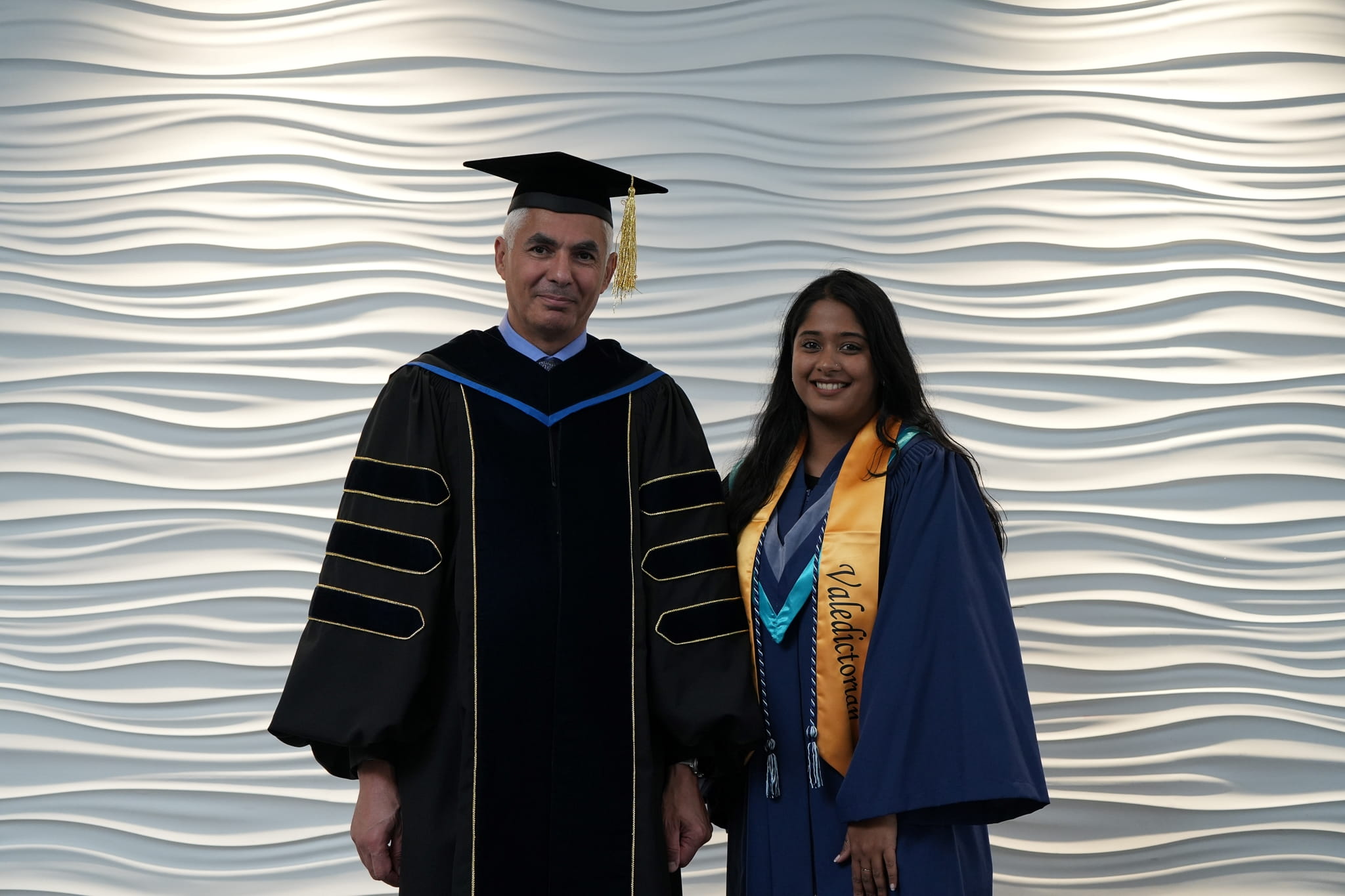 PSB Dean Muthana Zouri and valedictorian Grace Rebeca Verghese