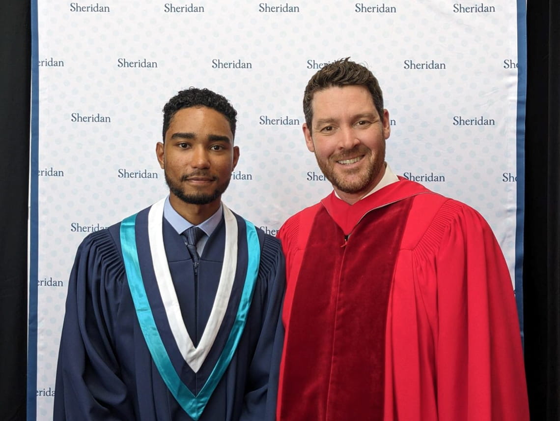 FAHCS valedictorian Robby Persaud and Dean Michael O'Leary