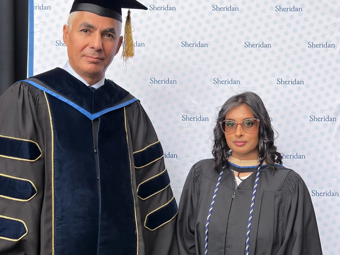 PSB Dean Muthana Zouri and valedictorian Sarah Rahim