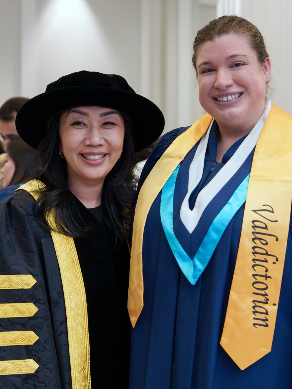 Sheridan president Cindy Gouveia poses with valedictorian Karina Bray.