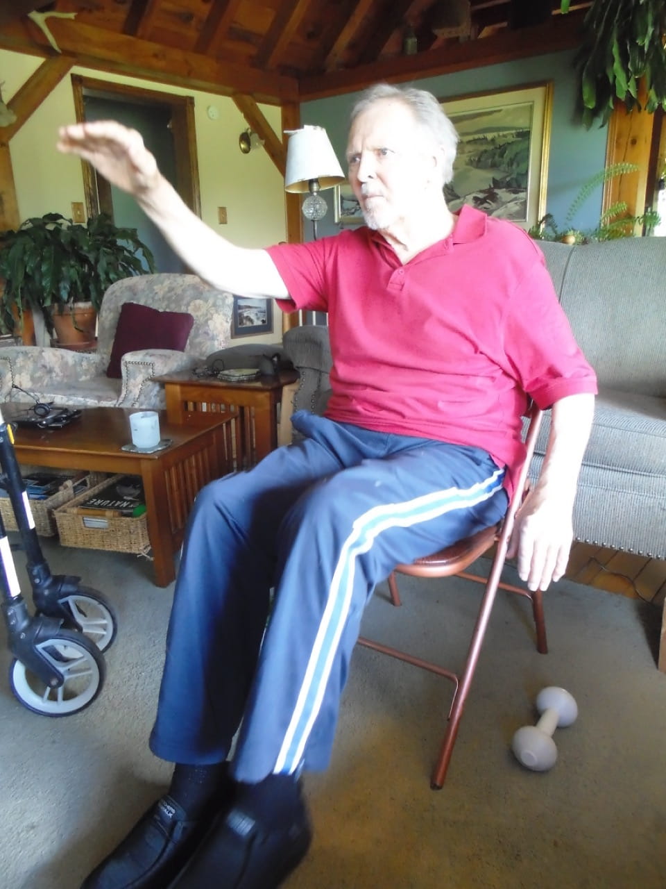 Movement Matters client John Wilson performs movement exercises during a virtual session with a Sheridan student therapist