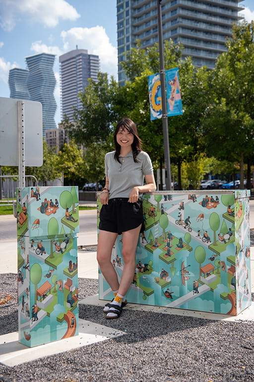 Chantal Lieu standing next to her art installation 'Infinite Space' at Scholars' Green Park in Mississauga