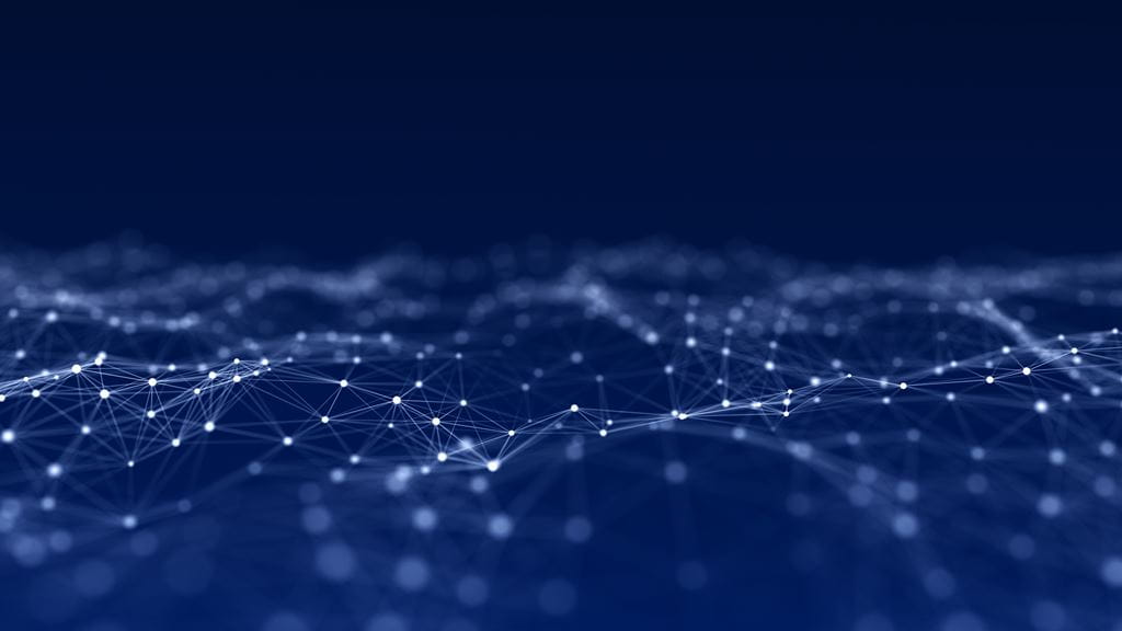 A blue and black image with dots representing artificial intelligence