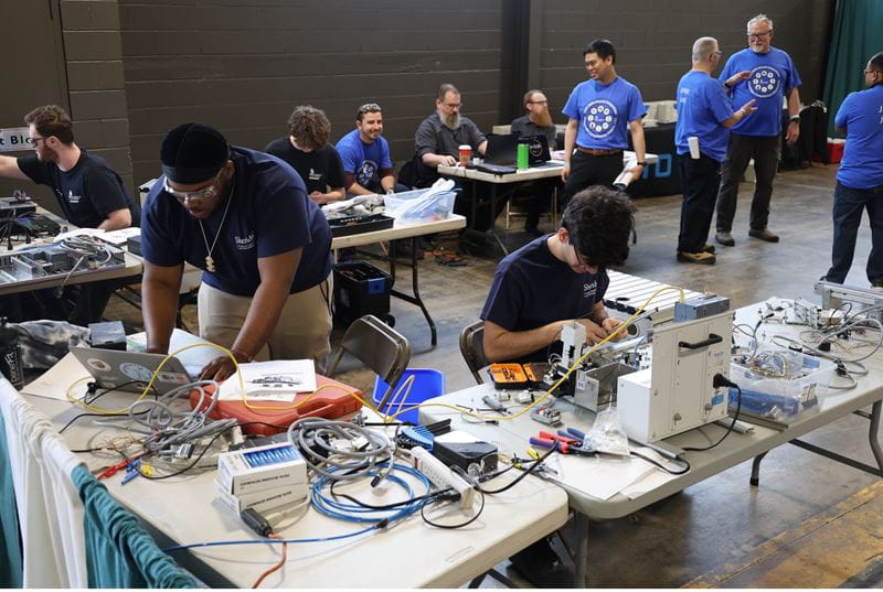 Two Sheridan students compete in the mechatronics team event.