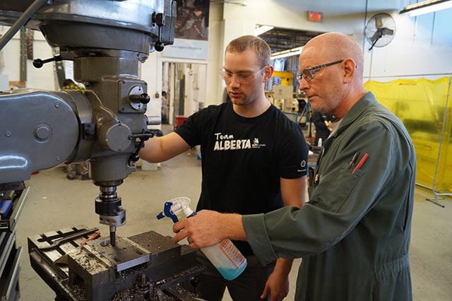 Peter and Craig working on an industrial machine
