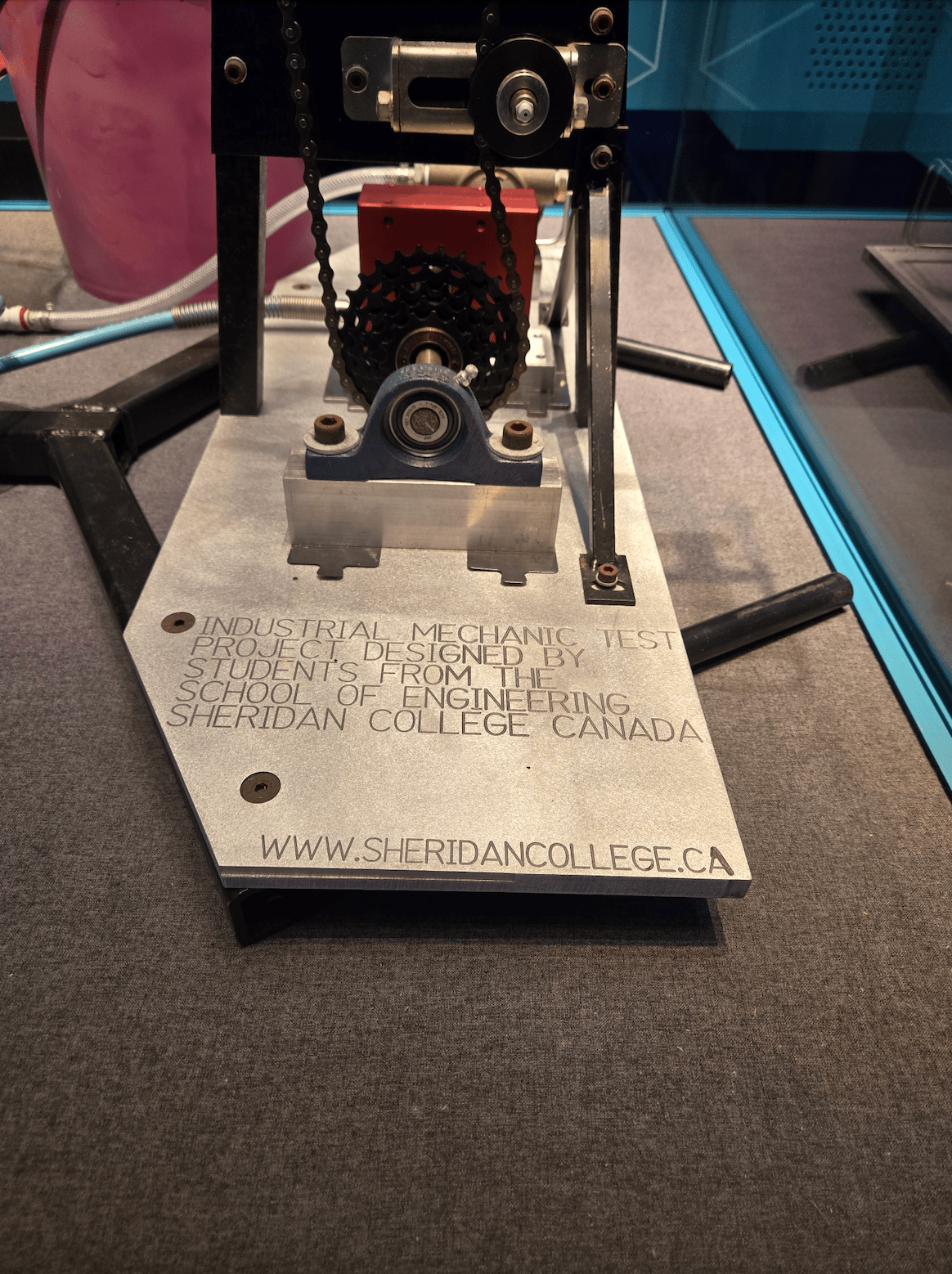 A baseplate of a water bike in the WorldSkills museum is inscribed with a credit to Sheridan College students