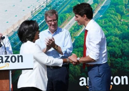 Amazon associate Patrice Thompson introduces Canadian Prime Minister Justin Trudeau at a groundbreaking event in Ottawa.