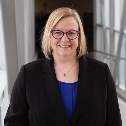 A head and shoulders portrait of Sheridan professor Dr. Bethany Osborne