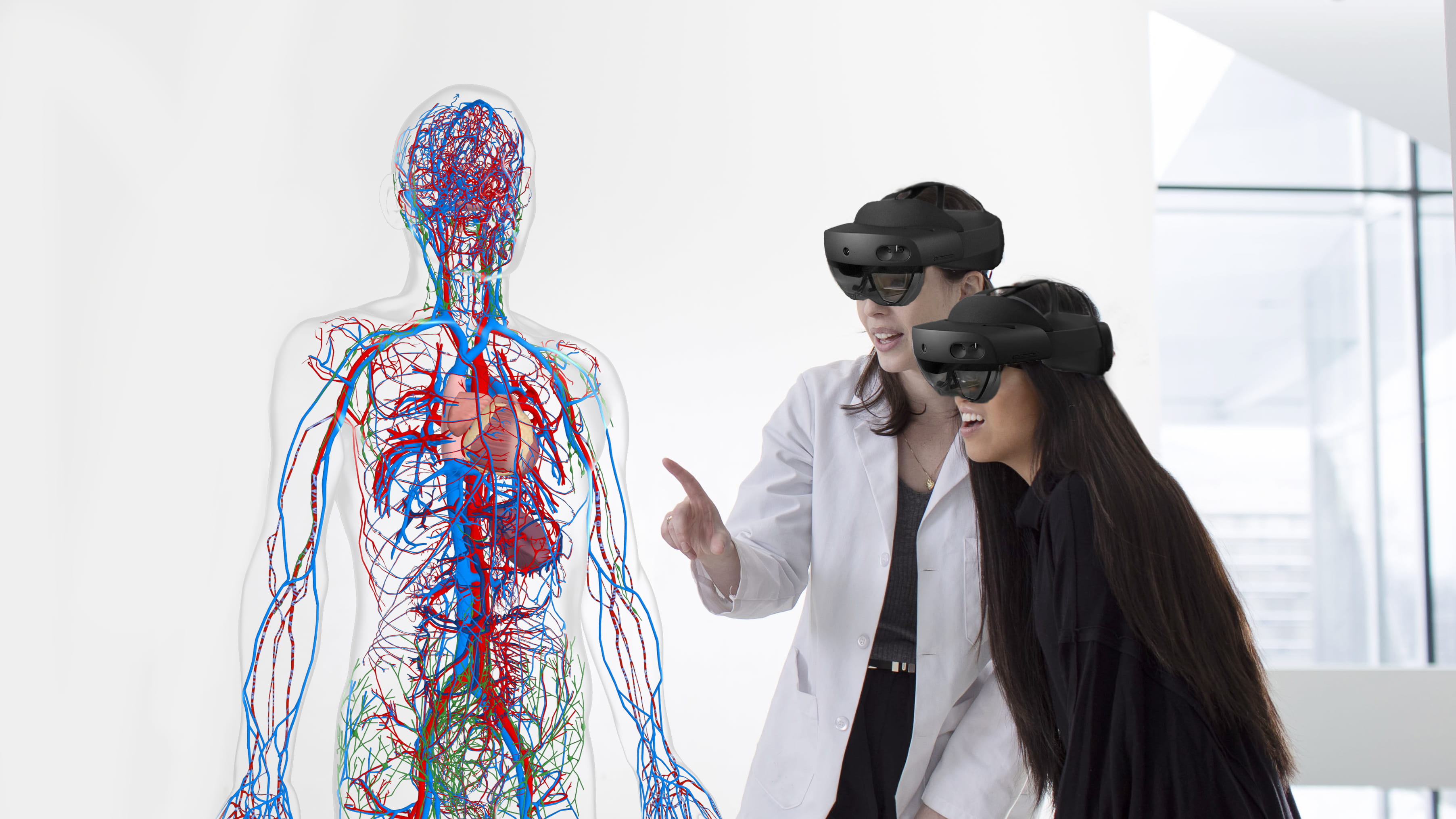 Students view a 3D holographic of anatomy using HoloAnatomy 3D mixed reality software.