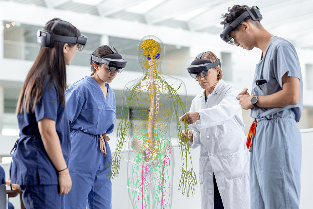 An instructor demonstrates HoloAnatomy 3D mixed reality software to several students