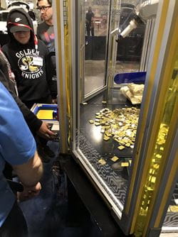 Robotic arm chocolate dispenser at the Sheridan booth