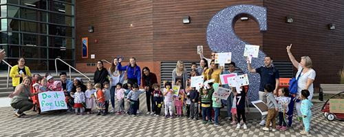 Daycare Centre students and staff rallying