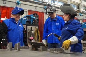 Premier Doug Ford welding at Sheridan with Minister Monte McNaughton and professor Carly Myers