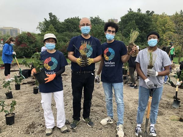 Volunteers working on garden