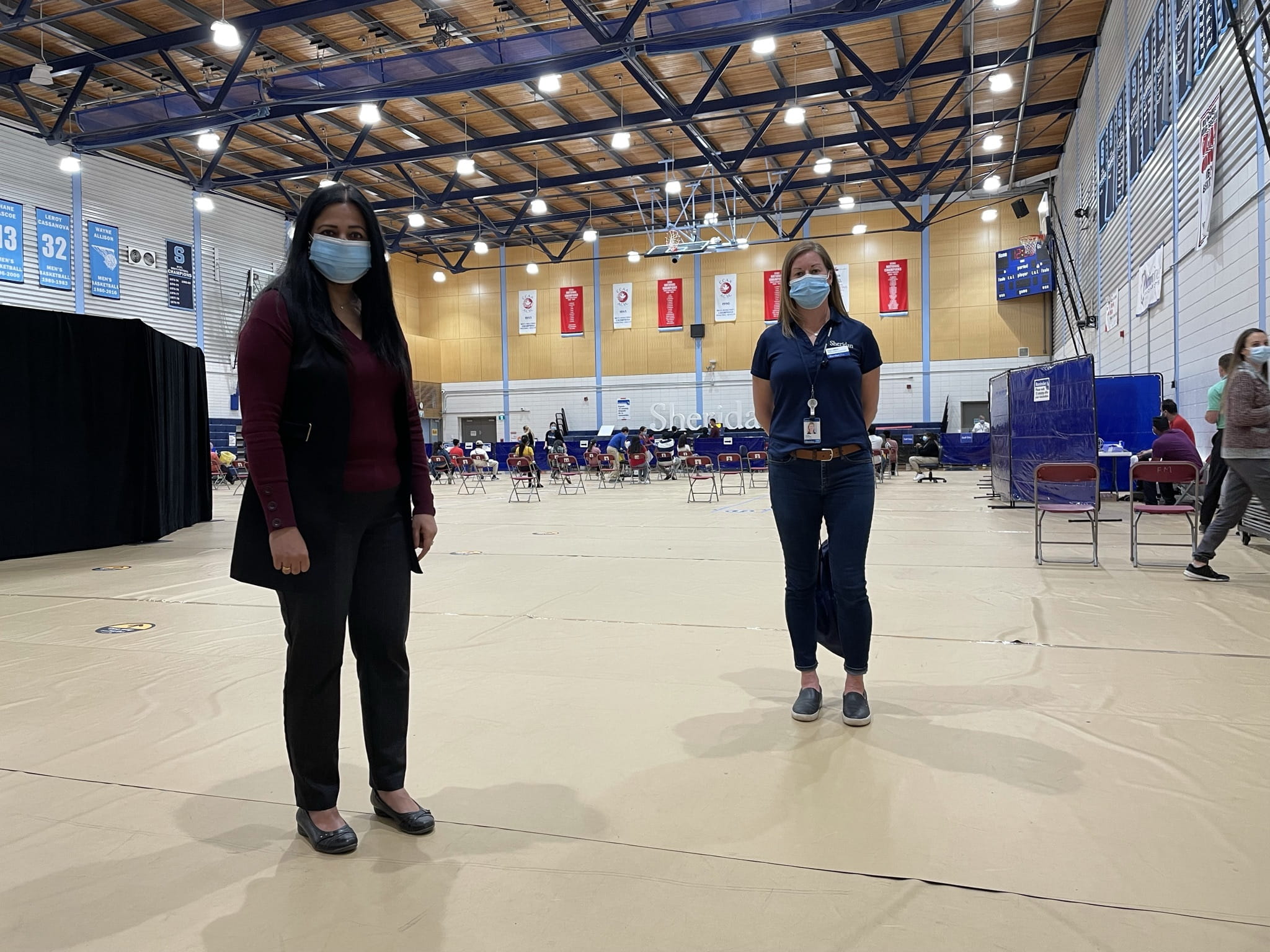 Two dignitaries in interior of Sheridan clinic