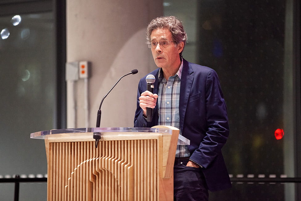 Person speaking at a podium