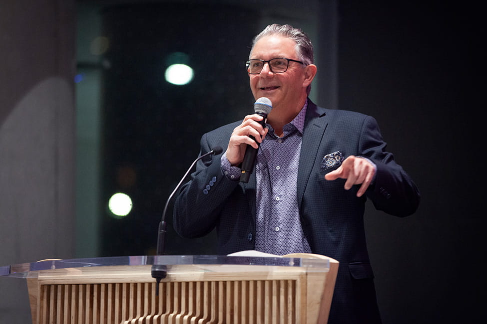 Person speaking at a podium